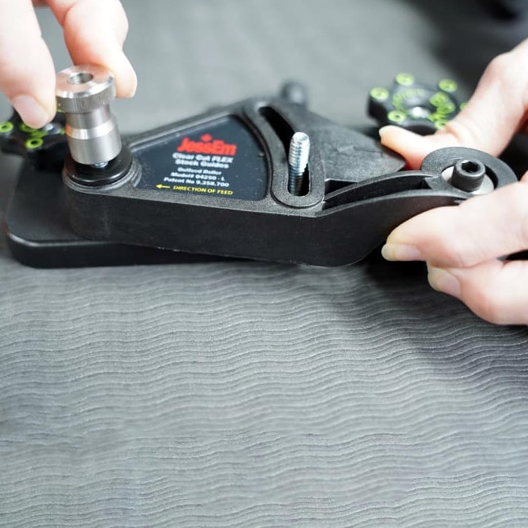 Person using Bow Products XT3 Xtender Fence Mounting Brackets on a Table Saw