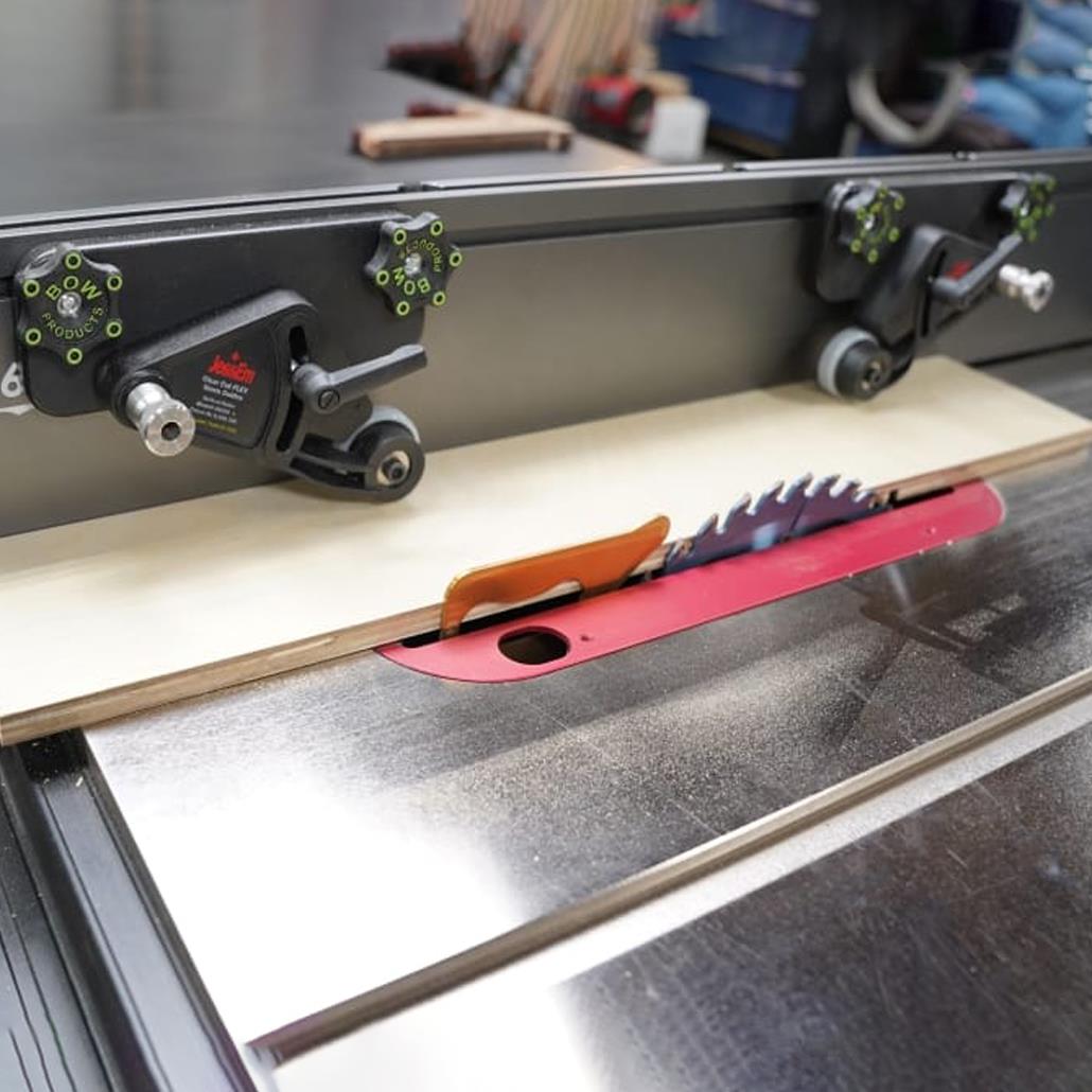 Bow Products XT3 Xtender Fence Mounting Brackets mounted on a Bow Xtender Fence on a Table Saw, guiding stock